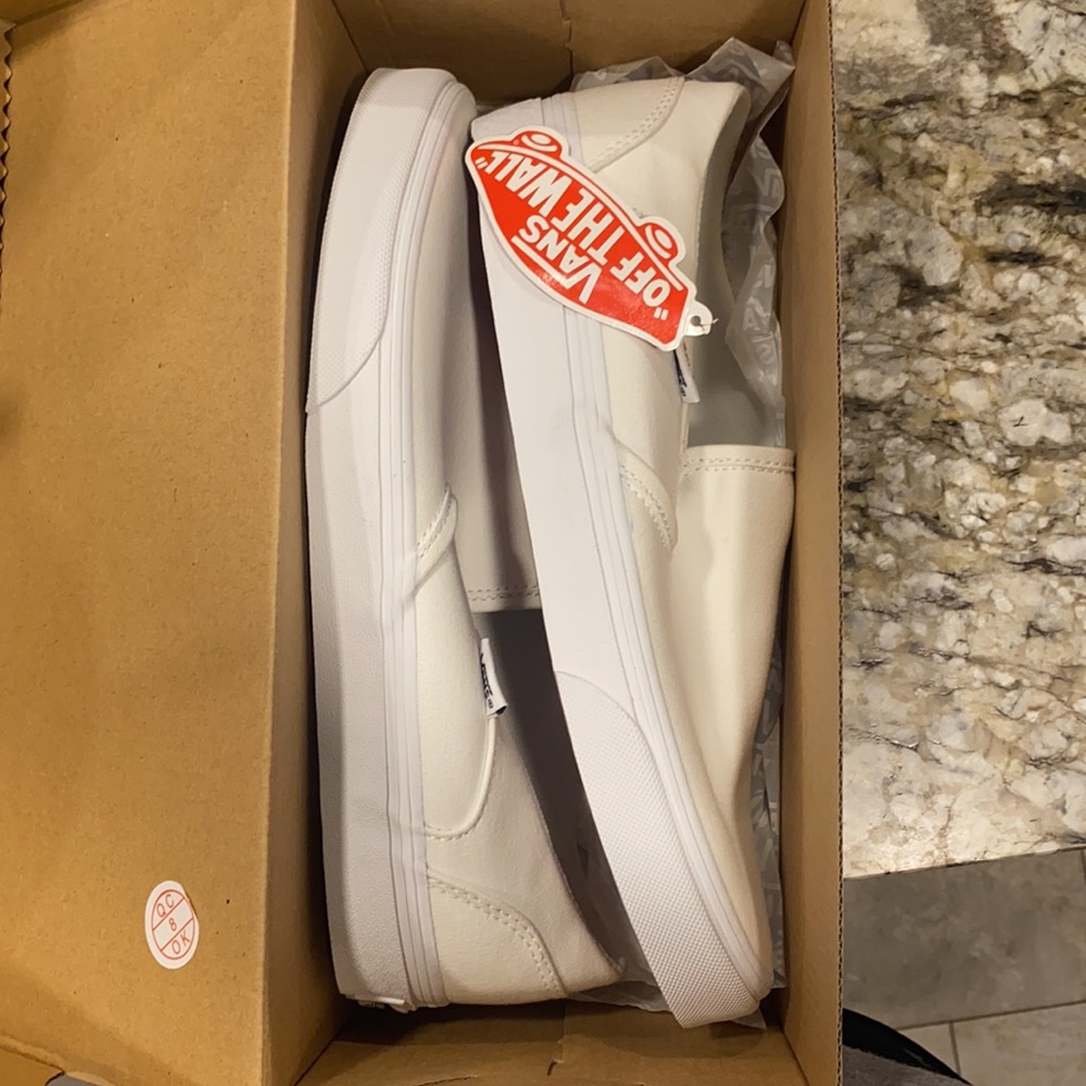 White slip on vans